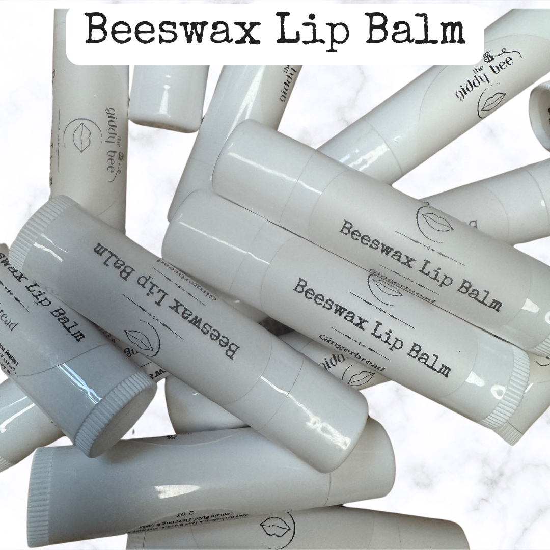 Handmade beeswax lip balm in a reusable tin, crafted with natural ingredients including herb-infused oil, castor oil, and pure beeswax for deep hydration and nourishment.